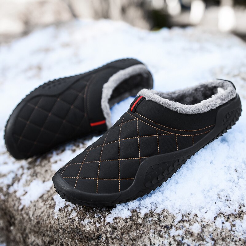 Warm and stylish, these men's slippers are perfect for winter days. The cozy lining keeps feet dry and comfortable, and the rubbery soles provide a sure footing for any day. The lightweight design adds style and comfort to any casual outfit. This pair is crafted from durable canvas material with a plushily cushioned insole. A secure constricting band around the ankle keeps the slippers securely in place. This pair is a fun and comfortable way to keep warm and stylish.